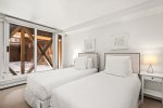Second bedroom: 2 Twin beds, convertible into King, and a TV
